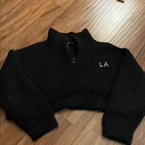 PrettyLittleThing Black Fleece Cropped Top